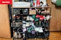 Shoes on messy entryway rack.