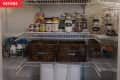 Before: Organized pantry with wire shelving