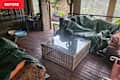 Tarps over furniture on enclosed porch before using the wait a year method.