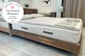 Avocado mattress in a showroom.