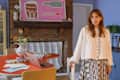 Portrait of Daniela Araya in a colorful work environment