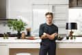 Jeremiah Brent in a kitchen with his Grove Collaborative collection