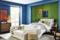 Pottery Barn BADG collection lifestyle image of a bedding set and art