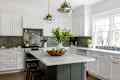 White kitchen with green ceramic tile backsplash
