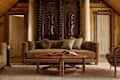Cozy living room with gorgeous wood door panels and a roll arm sofa from Pierce & Ward's West Elm Collection for 2026