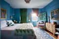 Blue bedroom using the cool color palette with blue, lilac, and green accents