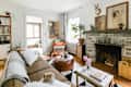 Cozy living room with warm neutral colors and multiple textiles, including chenille