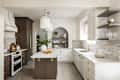 Modern kitchen featuring dark wood cabinetry, white marble countertops, and decorative open shelving with plants and dishware.