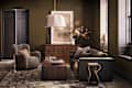 Cozy living room featuring a plush armchair, leather sofa, wooden coffee table, and floral decor in a warm color palette.