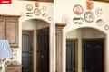 Wall-mounted decorative plates and a rabbit sculpture above an arched doorway, with dark wooden doors and a lamp in the foreground.