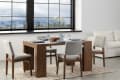 brown wooden dining table with gray chairs