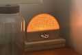 Hatch alarm clock on nightstand.
