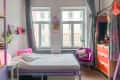 Color pops in dorm room.