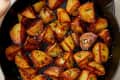 Crispy skillet fried potatoes in skillet.