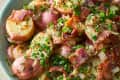 A bowl of classic German Potato Salad with Warm Bacon Dressing