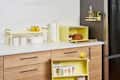 Yellow Yamazaki kitchen storage solutions.