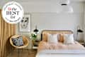 Neatly made bed in bedroom with Best List seal to the left.