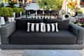 Neighbor Roundabout Sofa on someone's back patio