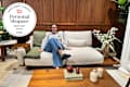 Woman sitting on sofa at Castlery.