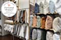 Bedding section at the Parachute store with a Personal Shopper seal in upper left