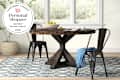 Wayfair dining table in room with seal in upper left that reads "Apartment Therapy Personal Shopper: Wayfair Dining Tables 2026"