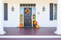Fall Decoration Adorns Beautiful Entry Way To Home.