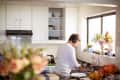 Adult man preparing food in the kitchen. - stock photo