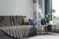 Ultrasonic cool mist humidifier for home on a small table in living room