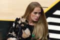 Singer Adele looks walks in during the second half in Game Five of the NBA Finals between the Milwaukee Bucks and the Phoenix Suns at Footprint Center on July 17, 2021 in Phoenix, Arizona.