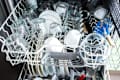 Glasses and plates in a dishwasher