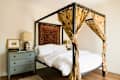 Canopy bed in bedroom