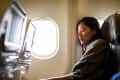 Woman sleeping on airplane