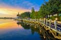 Sunset on the boardwalk on the waterfront at The Villages, Florida.