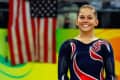Gold medalist Shawn Johnson of the United States stands on the podium during the medal ceremony for the Women's Beam Final at the National Indoor Stadium on Day 11 of the Beijing 2008 Olympic Games on August 19, 2008 in Beijing, China. (