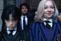 Wednesday. (L to R) Jenna Ortega as Wednesday Addams, Emma Myers as Enid Sinclair in episode 102 of Wednesday.