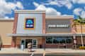 Cape Coral, FL, USA 3/11/20 :  Aldi in Cape Coral’s Coralwood Shopping Center during the day, Aldi a global family-owned discount supermarket chain based out of Essen, Germany