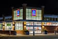 BAYPORT, MN/USA - FEBRUARY 22, 2020: Aldi grocery store at night and trademark logo.
