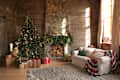 Festive interior with decorated Christmas tree and fireplace