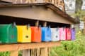 row of colorful mailboxes