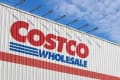 Tigard, OR, USA - Oct 31, 2023: Closeup of the Costco logo seen at its store in Tigard, Oregon. Costco Wholesale Corporation operates a chain of membership-only big-box retail stores.