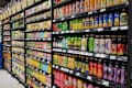 Kuala Lumpur, Malaysia - Dec 23, 2024: A colorful and well-stocked beverage aisle at Mercato Grocery featuring a variety of drinks including teas, fruit juices, and bottled beverages.