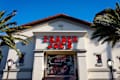 Sunnyvale, CA US - March 22, 2025: Trader Joe's logo sing on the store facade in Silicon Valley, blue sky, sunny . Trader Joe's is an American grocery store chain headquartered in Monrovia, California