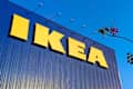 IKEA Store sign and logo hanging on the store building with a natural complement. The world's largest retailer of interior and exterior products needed.