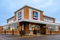 Rome, New York - Dec 17, 2025: Close-up overcast view of Aldi Market, which stands for Albrecht Discount. ALDI is a Global Discount Supermarket Chain that Originated in Germany