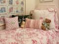 Floral bedspread in dorm room.