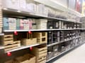 Shelves at a Target store with caddies and organizers