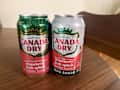 Two cans of Strawberry Fruit Splash one with zero sugar.