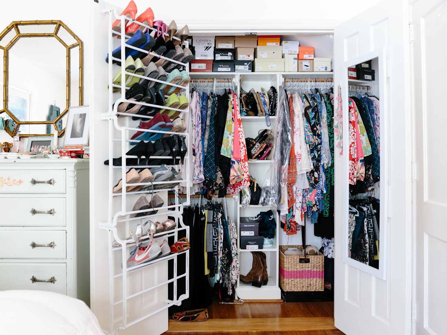 Shared closet organization with clearly defined storage zones for easy daily use.