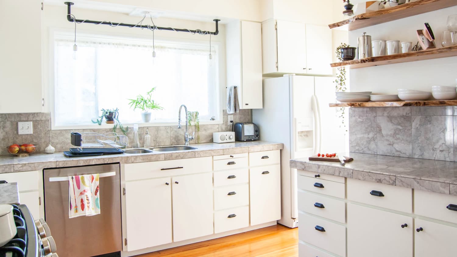 Here S How Hidden Cabinet Hacks Dramatically Increased My Kitchen Storage Apartment Therapy