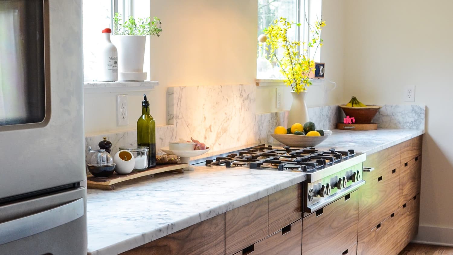 My Experience Of Living With Marble Countertops One Year Later Kitchn Carrara white italian marble wide bevel 4 x 4 tile polished. with marble countertops